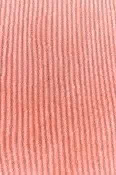 Close-up of a seamless textured coral fabric ideal for design projects.