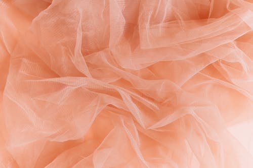 Free Crumpled Peach Tulle Fabric Stock Photo