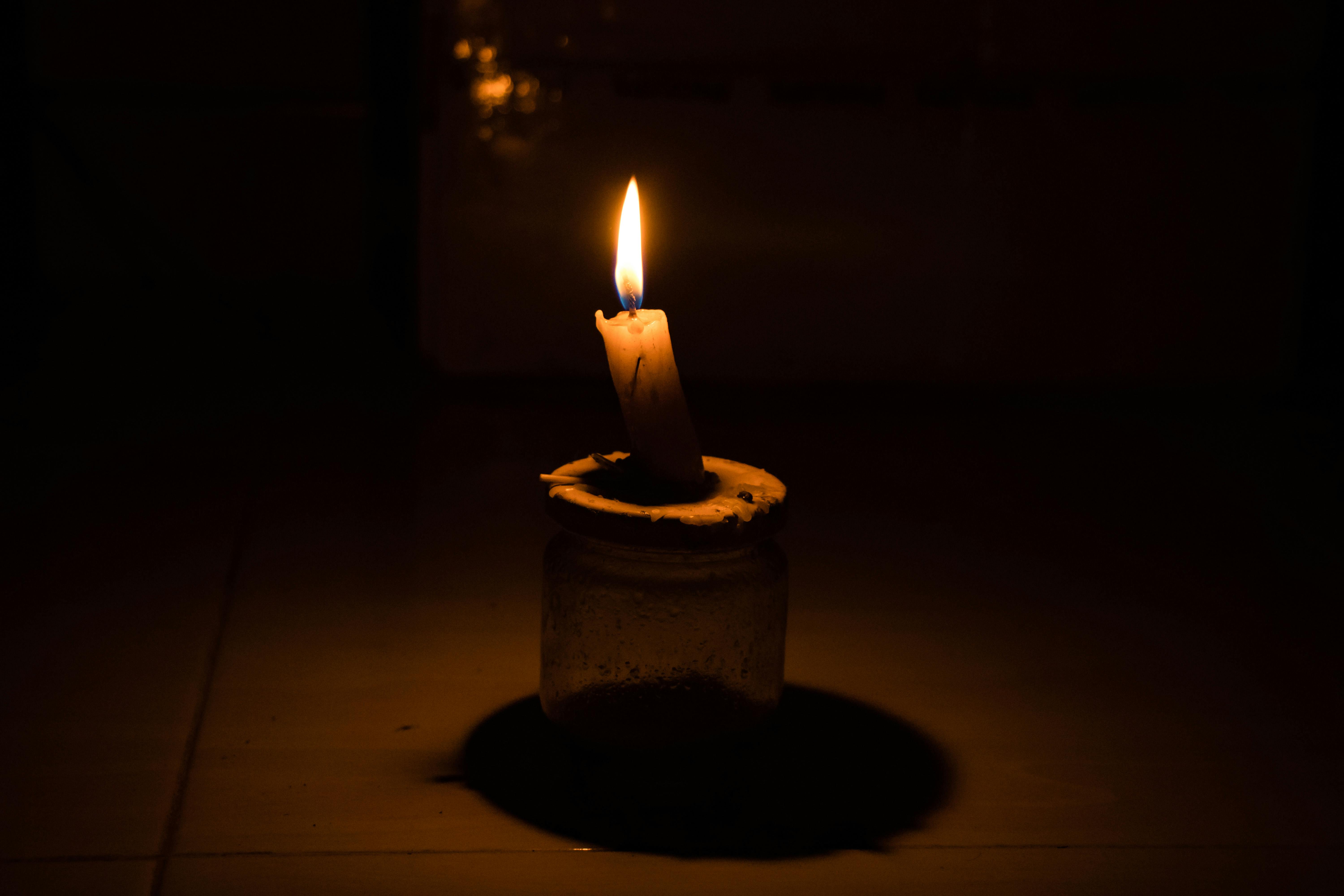 Free stock photo of Candle light in the dark