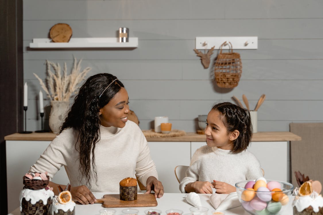 Free Mother and Daughter Talking at Home Stock Photo