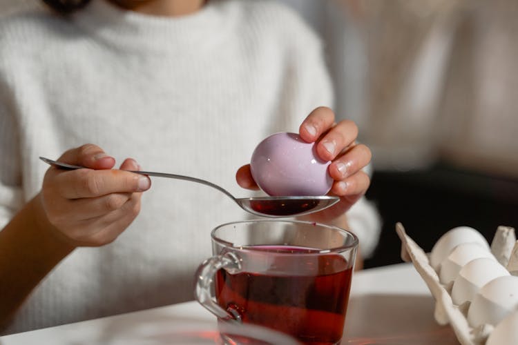 Close-up Photo Of Coloring An Egg 