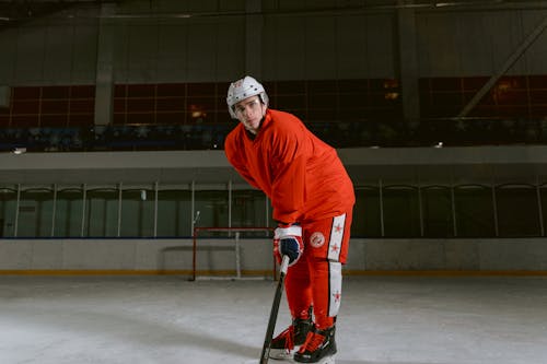 A Hockey Player in the Ice Rink 
