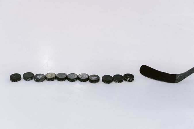 Hockey player skating with the puck during a fast break on the ice