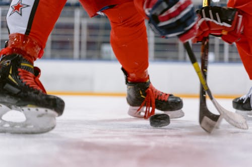 Athletes Playing Ice Hockey in Close-up Photography