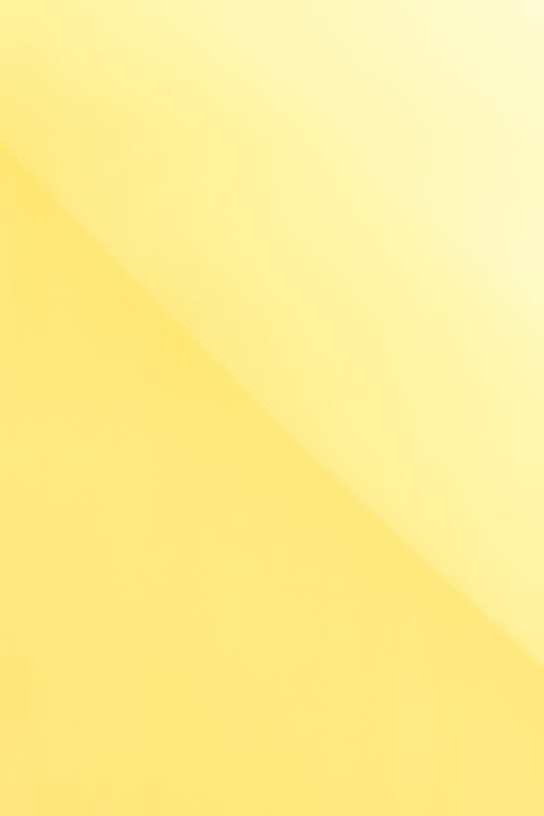Bright yellow background with contrast diagonal line · Free Stock Photo
