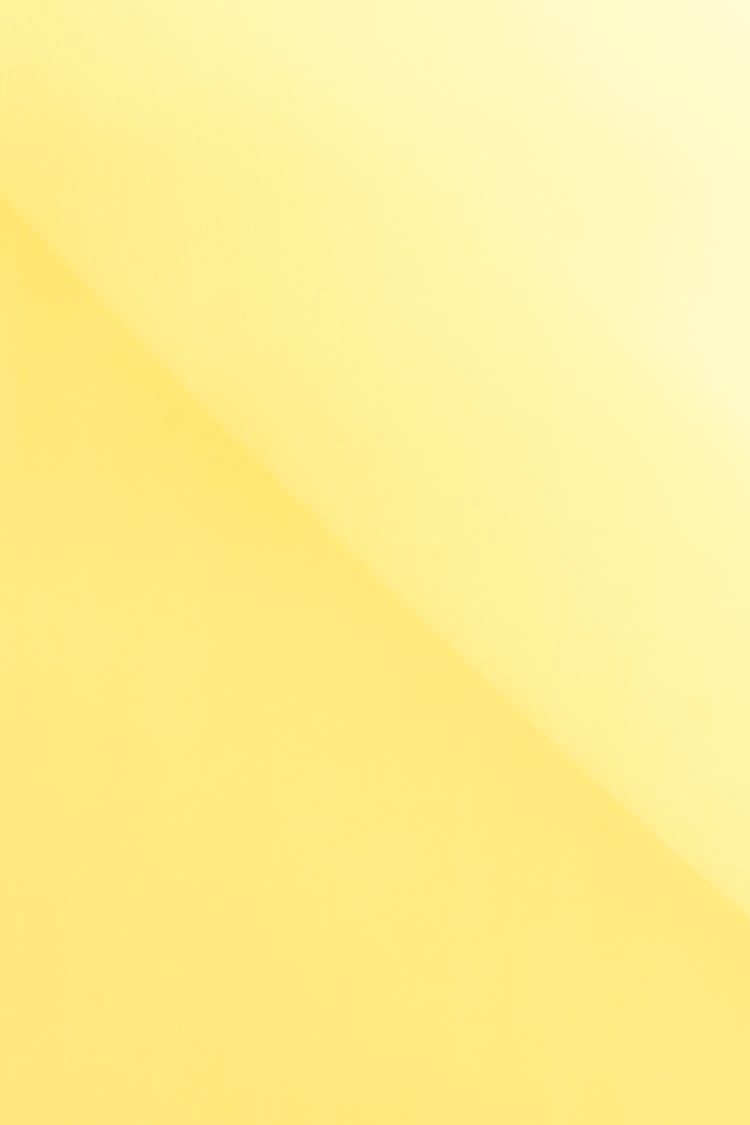 Bright Yellow Background With Contrast Diagonal Line