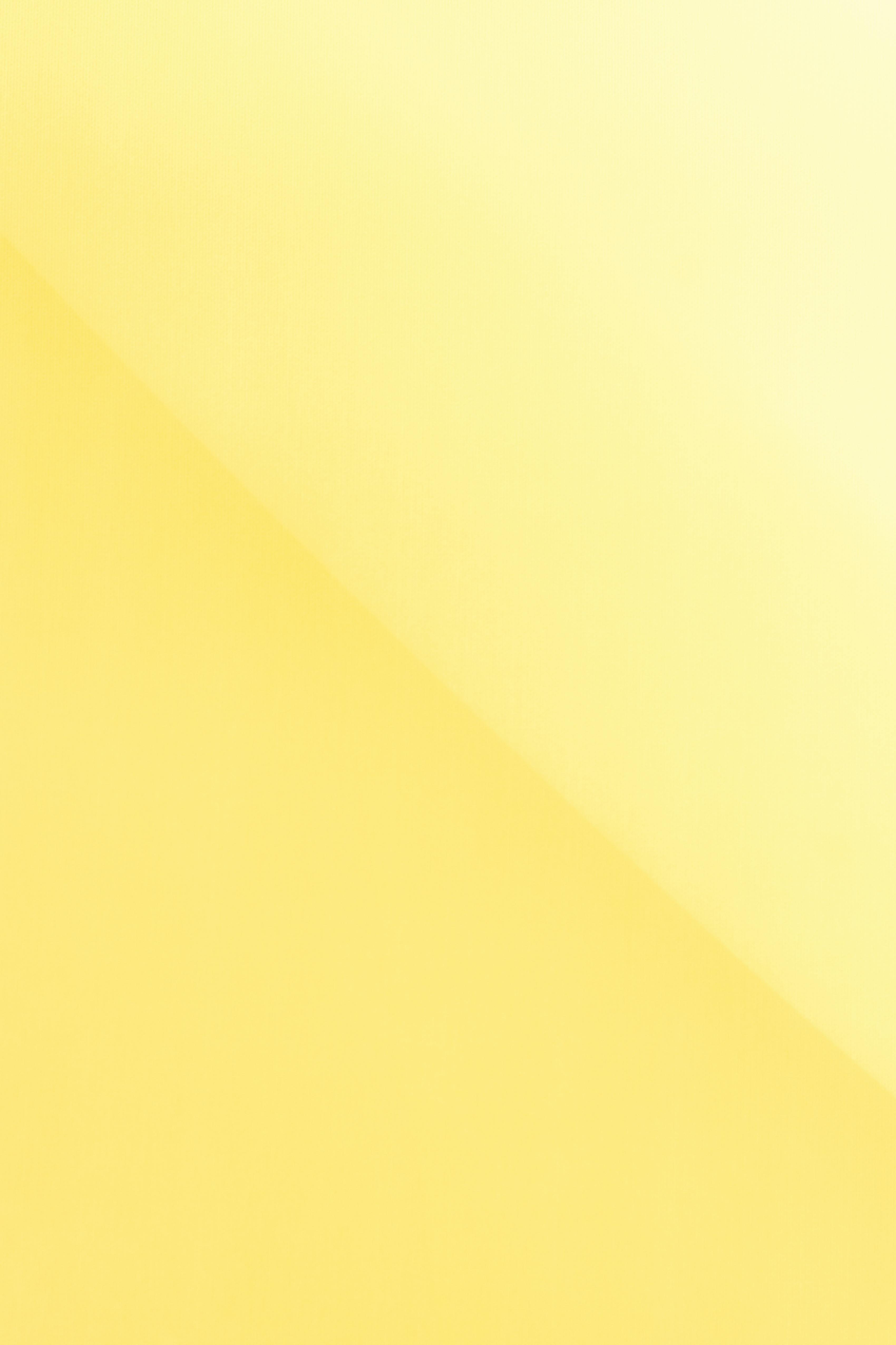 Bright yellow background with contrast diagonal line · Free Stock Photo