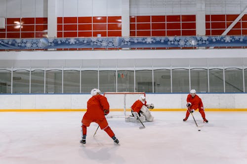 Hockey Players in Red Uniform