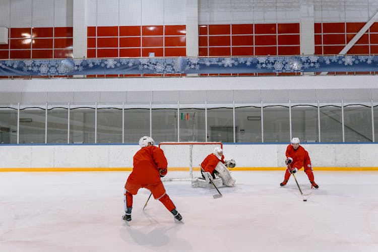 Hockey Players In Red Uniform