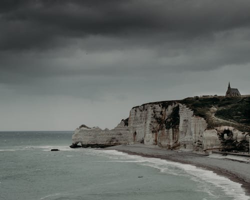 Rocky formations near rippling sea