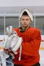 A Man in Red Hockey Uniform