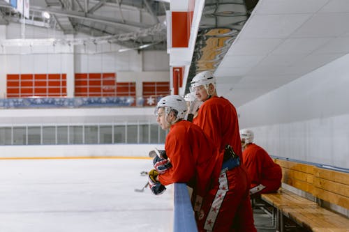 Hockey Players Wearing Red Uniform