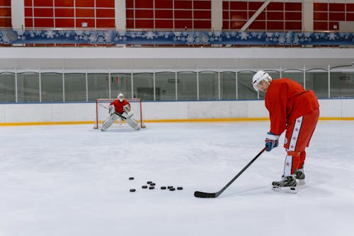 Men Playing Ice Hockey