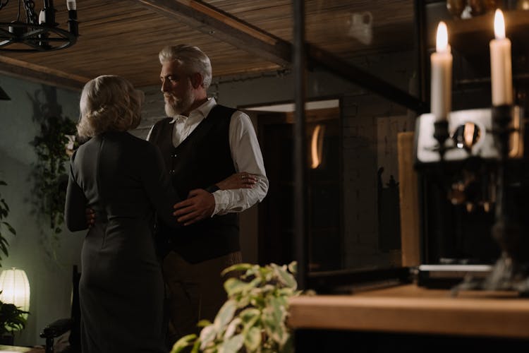 Elderly Couple In A Kitchen