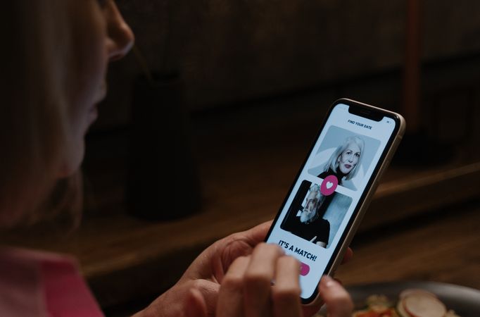 couple using dating app on smartphone