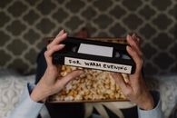 Person Holding Black and White Box