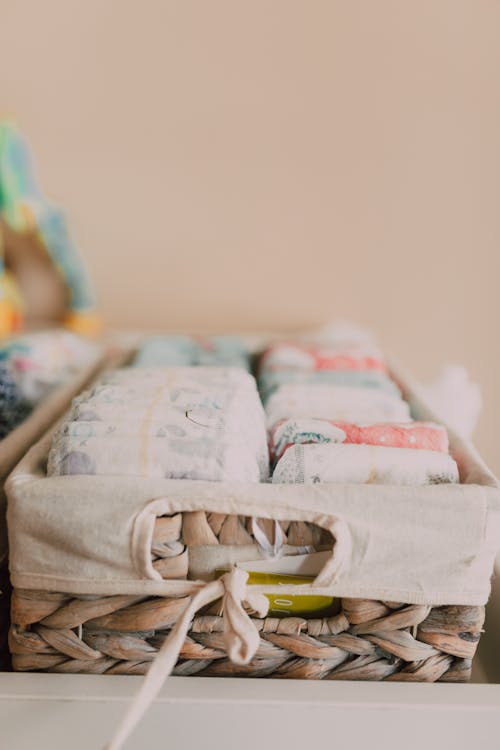 Free Baby Diapers on a Basket Stock Photo
