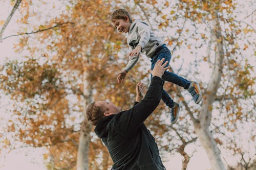 Free Photo of Father and Son Having Fun Stock Photo