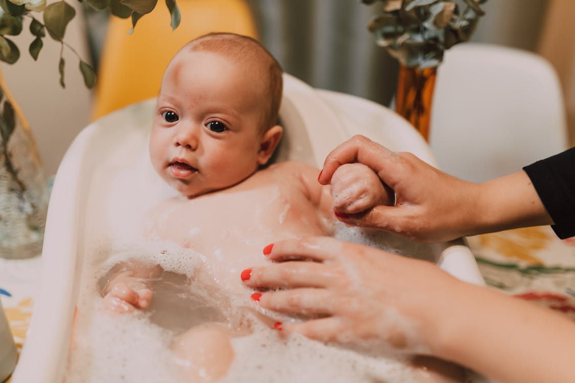 Free A Baby Getting a Bath Stock Photo