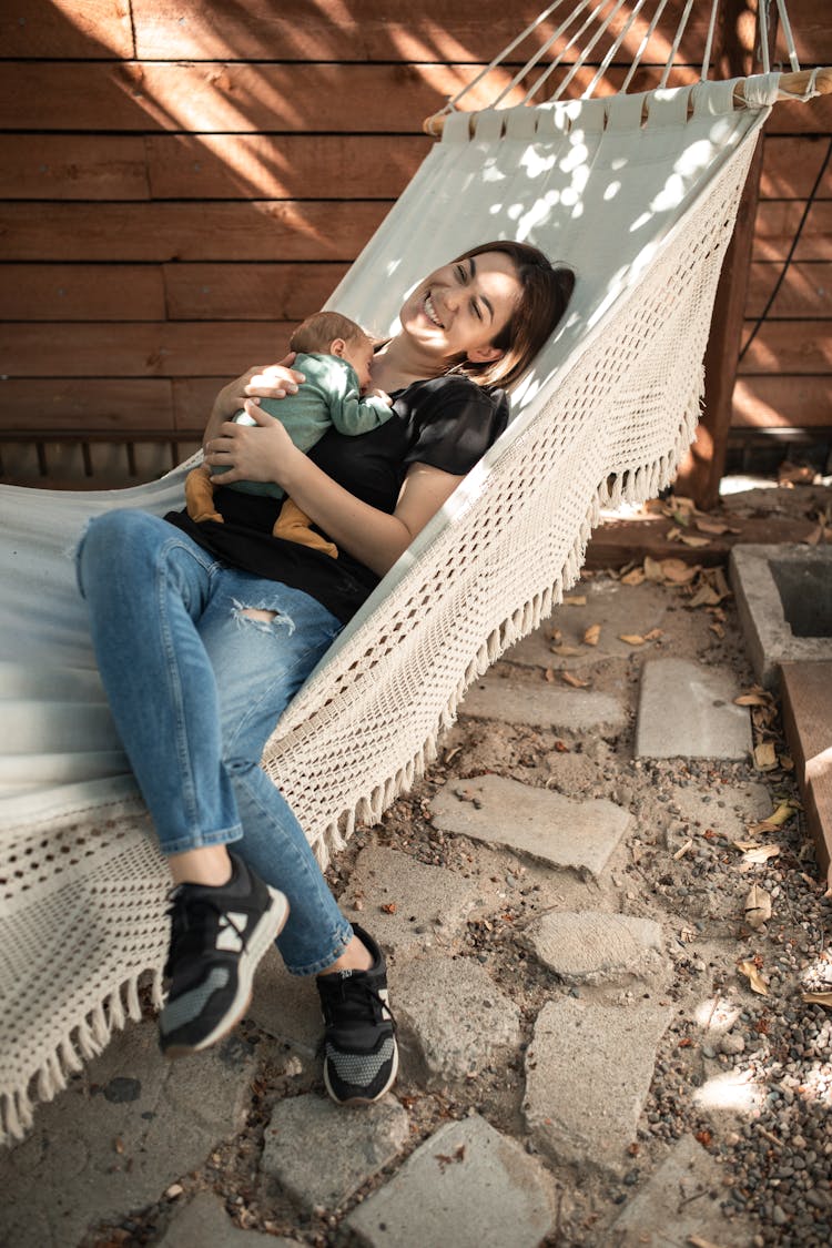 Woman Lying On Hammock