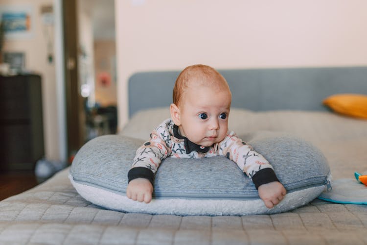 A Baby On A Pillow