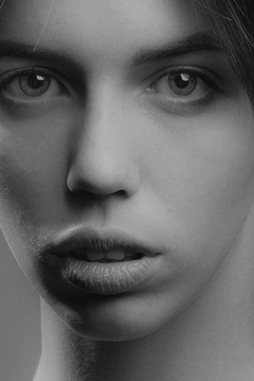 Free A Grayscale Photo of Woman's Face Stock Photo