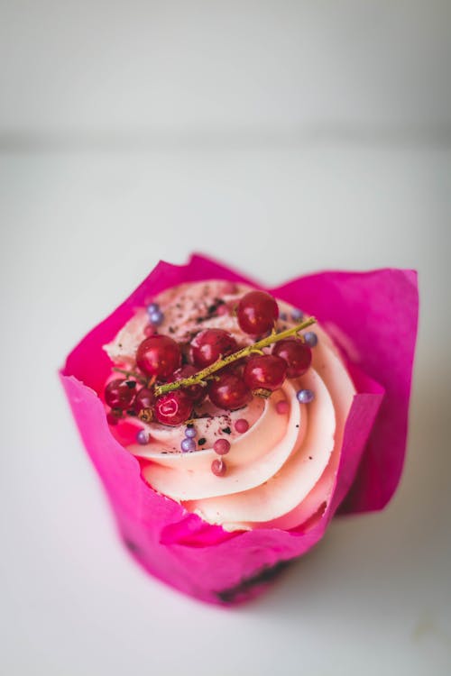 Free Cupcake With Red Berries on Top Stock Photo