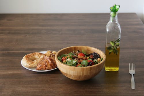 Bowl of Vegetable Salad on Wooden Table