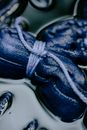 Tied textile in liquid with paint