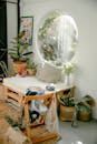 Cozy light room with wooden furniture and various potted houseplants
