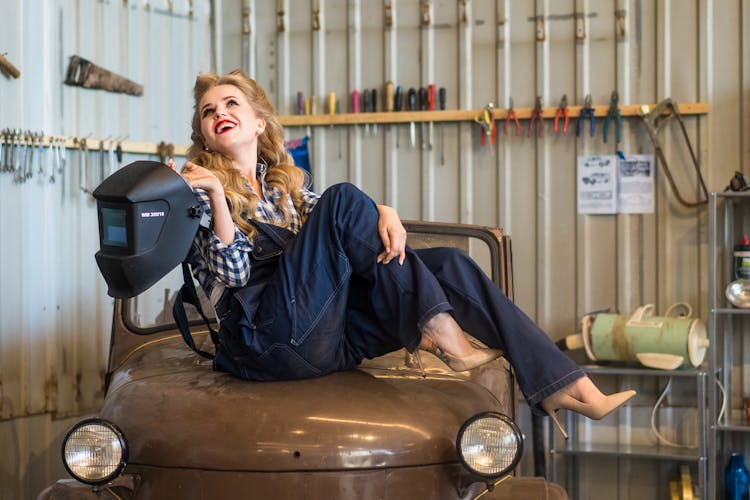 Female Mechanic In Overall With Welding Mask On Retro Car