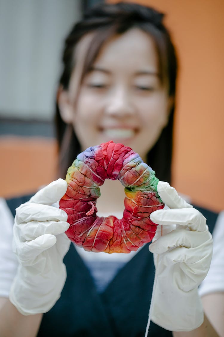 Woman Holding Tie Dyed Fabric