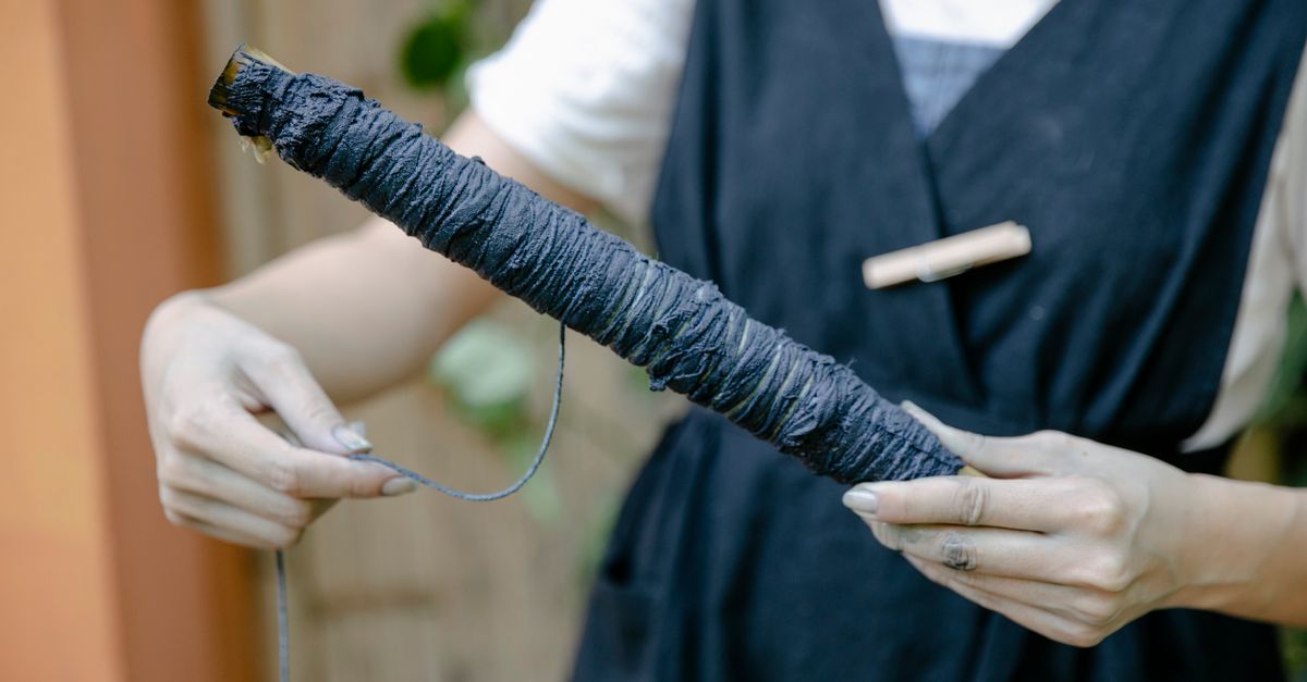 Stic A Thread Close-up of a Woman Looping a Thread Around a Stick · Free Stock Photo