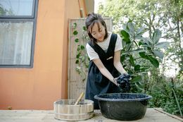 Dyeing cloth in a garden dye house — Photo by Teona Swift on Pexels
