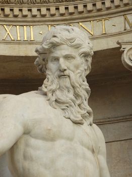 Close-up of a detailed statue at Trevi Fountain, Rome, showcasing classical artistry.