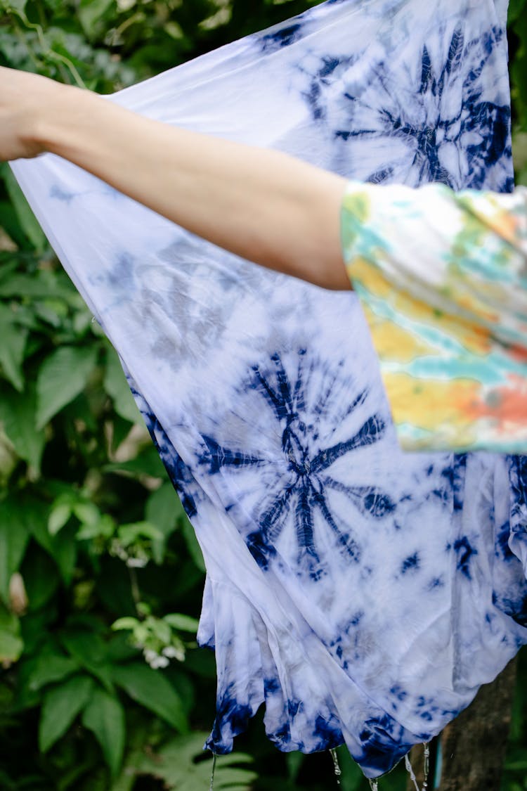 Woman Holding Wet Tie Dye Fabric 