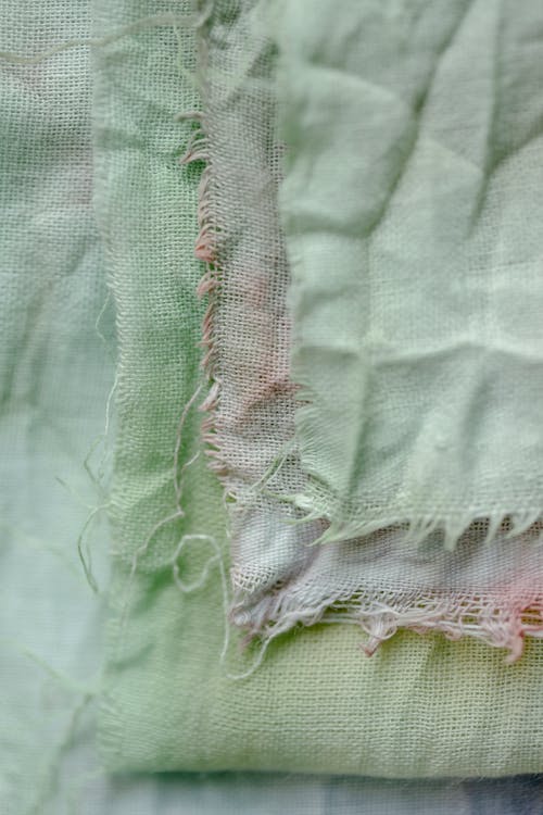 Crumpled painted fabric in sewing workshop