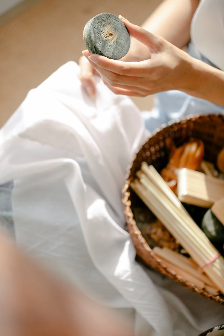 Woman With Paint And Sticks For Manual Dyeing Technique