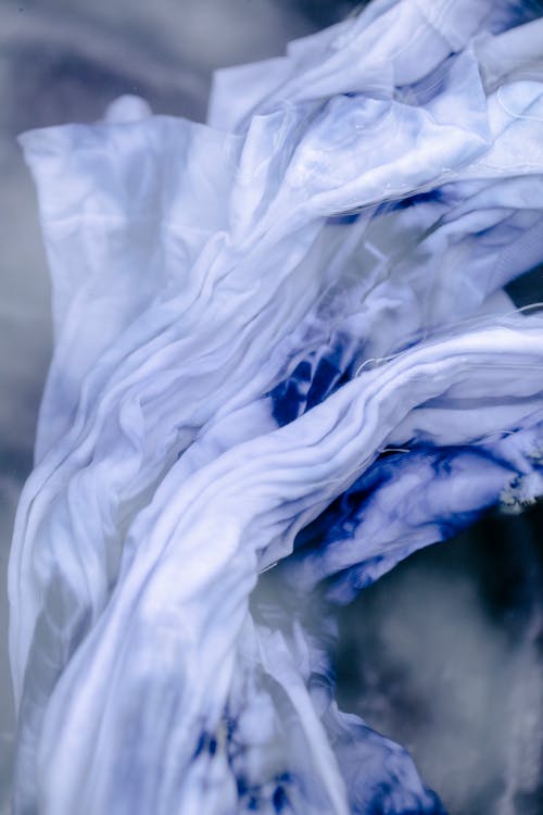 Crumpled wet cotton fabric with shibori ornament