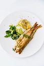 Fried Fish With Green Vegetables Side on White Ceramic Plate