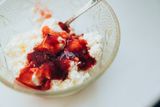 Cottage cheese with fruit in a glass bowl — photo by Zizi zi on Pexels