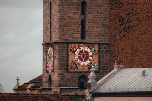 Free Clock on the Wall of a Church Stock Photo