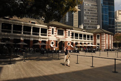 People in front of Museum in a City 