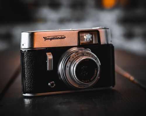 Free A vintage Voigtlander camera captured in a close-up, showcasing its classic design and retro appeal. Stock Photo