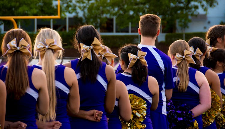 Photo Of Cheerleaders In Blue-and-white Uniform