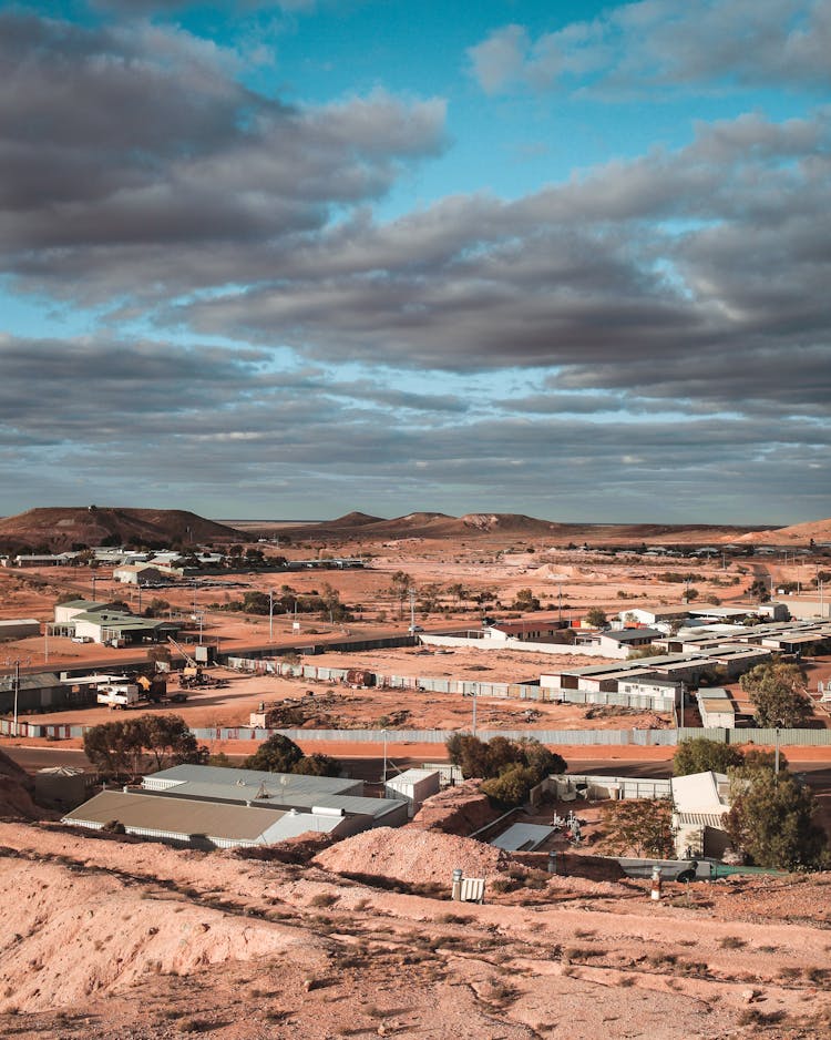 Rain Clouds Over Town On Desert