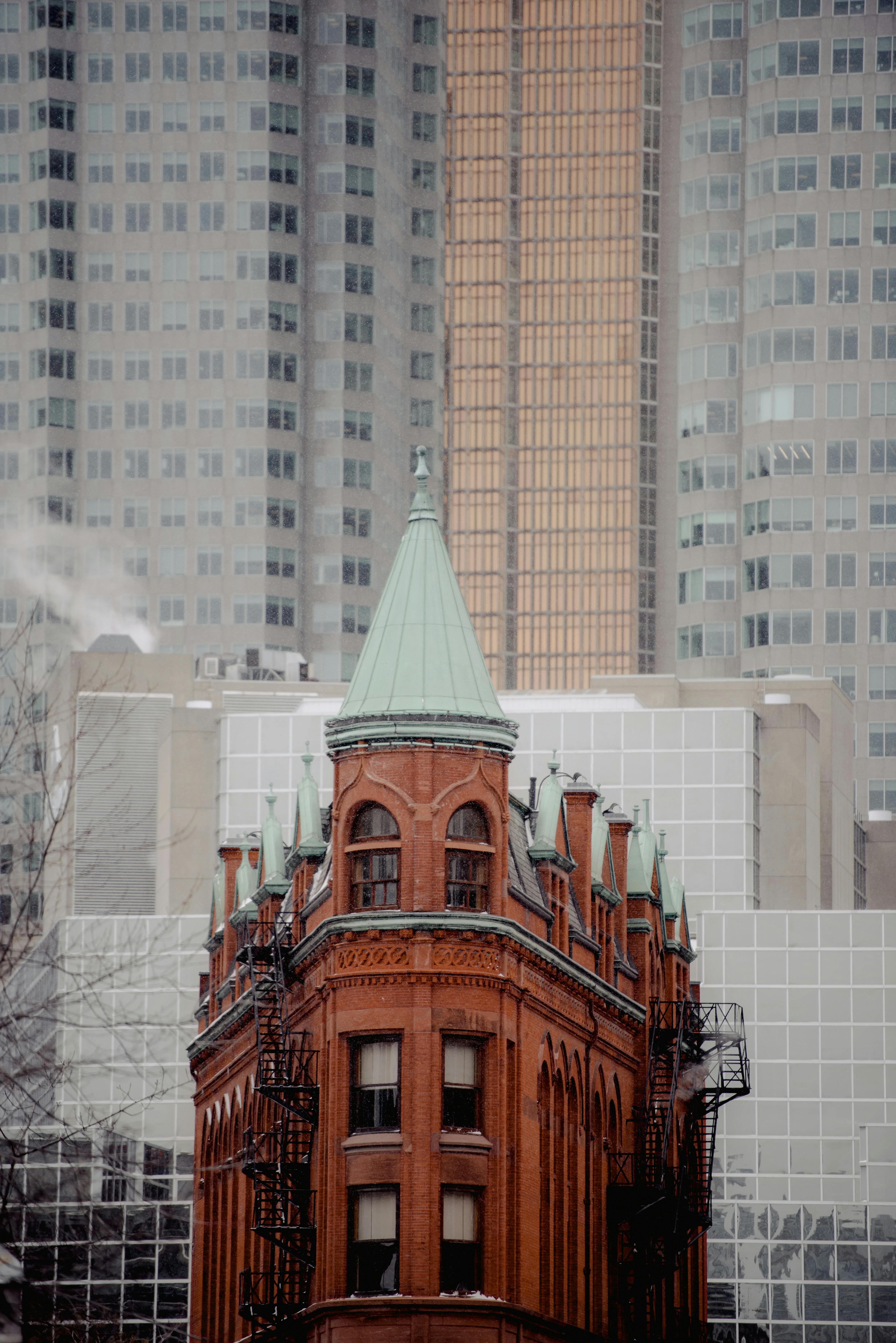 gooderham building near modern houses