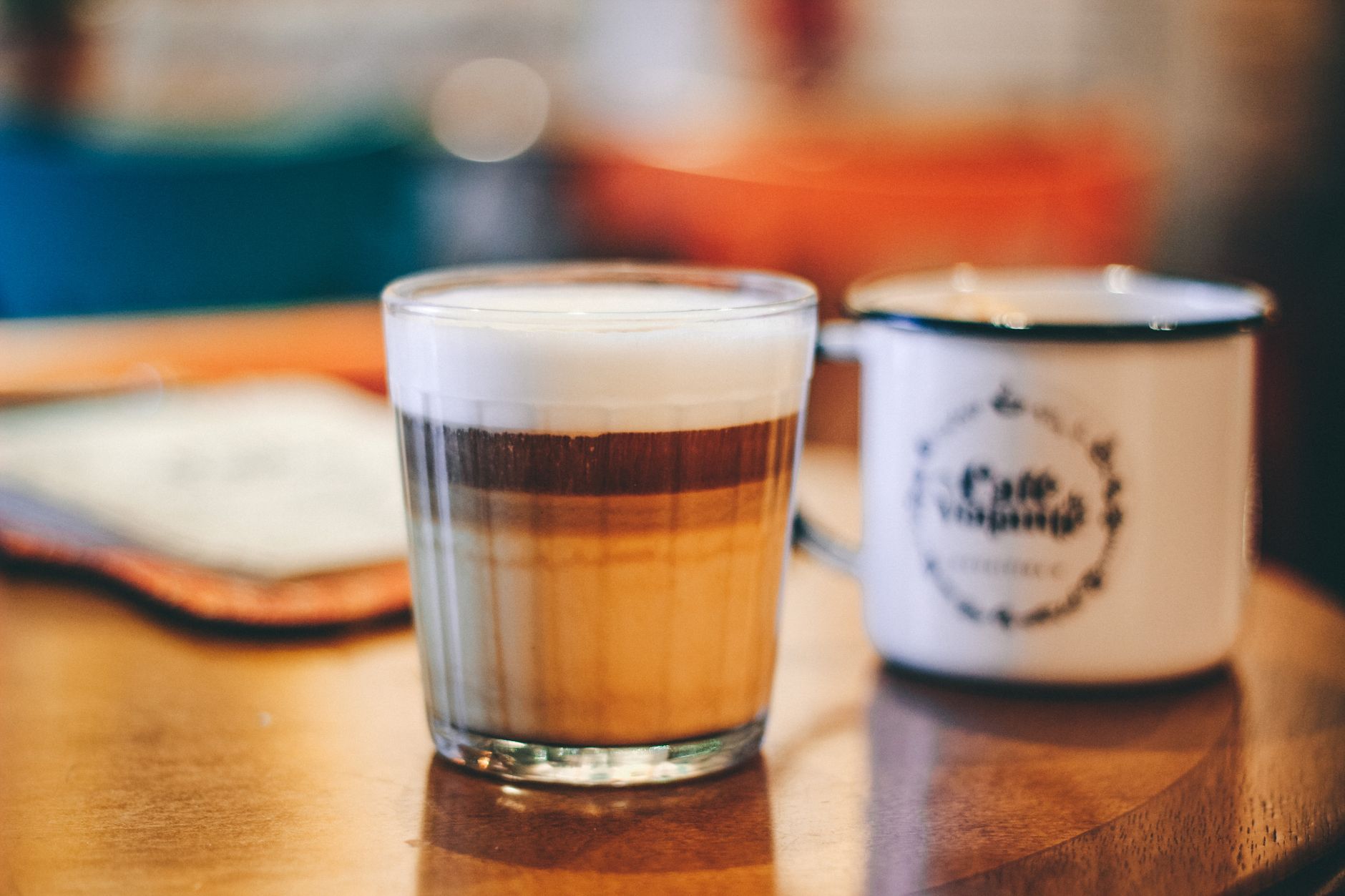 A classic macchiato with a single espresso shot marked by foam