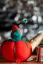Close-Up Shot of a Red Pincushion Beside a Thimble