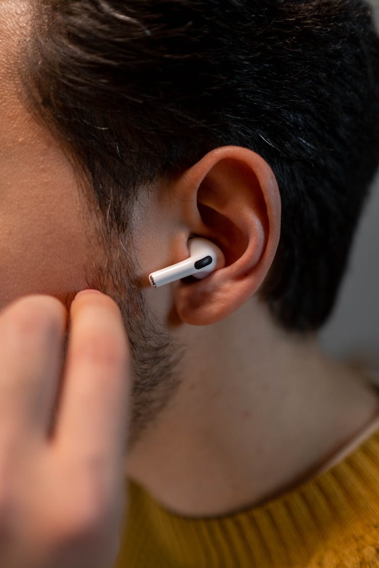 Airpods Pro On The Person's Ear 